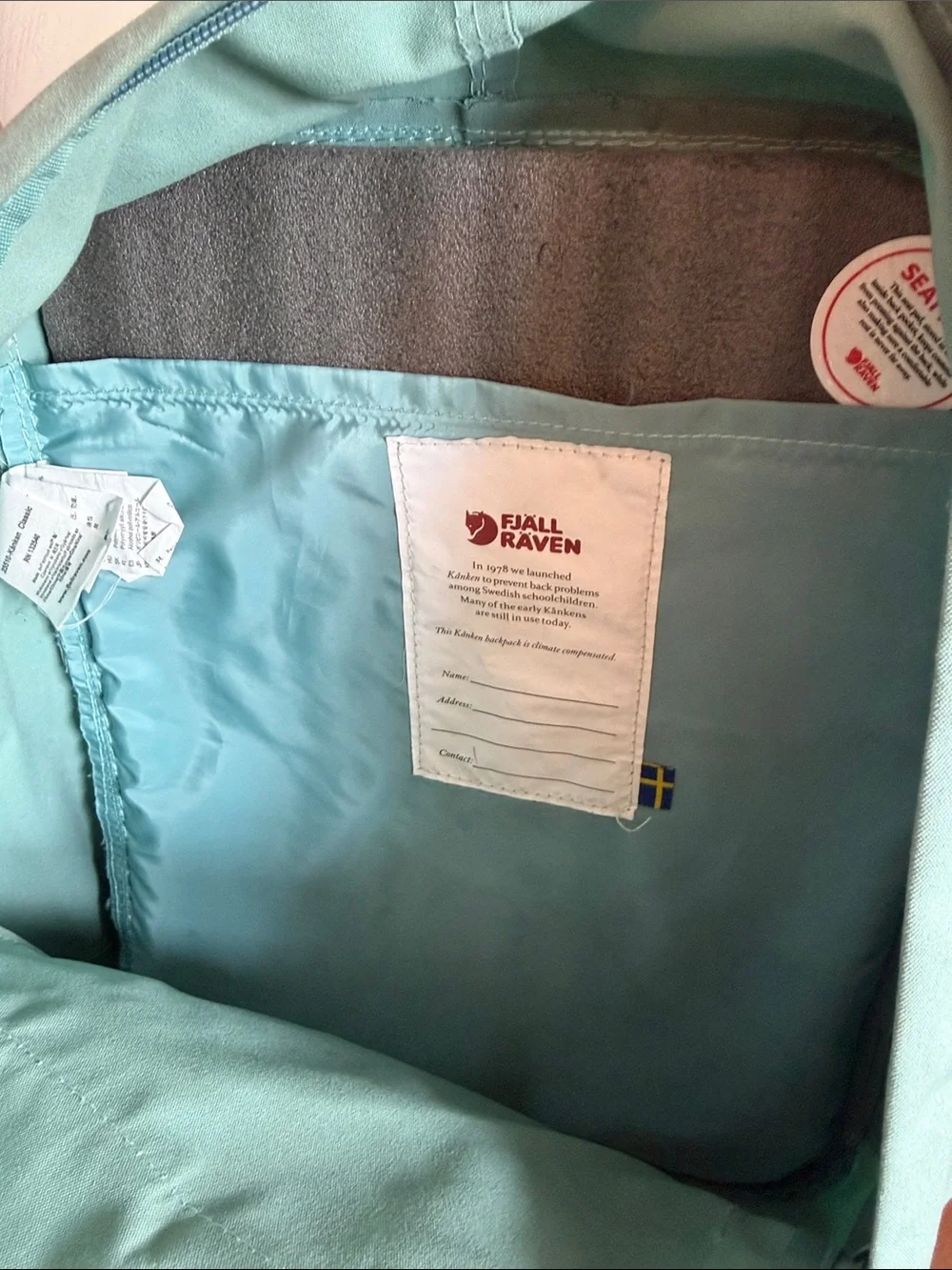 Fjallraven Backpack - Teal with Pink Accents.